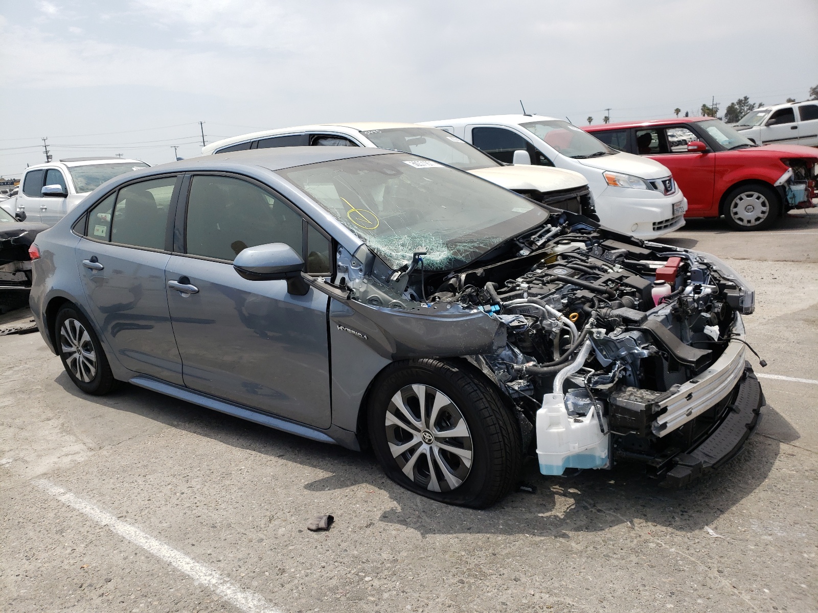 TOYOTA COROLLA LE 2021 with VIN JTDEAMDE5MJ027226 - Photo from auction