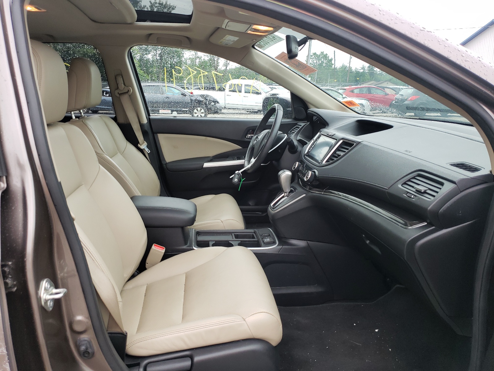 Photo 5 from auction – 2016 HONDA CR-V EXL with VIN 5J6RM4H75GL061853