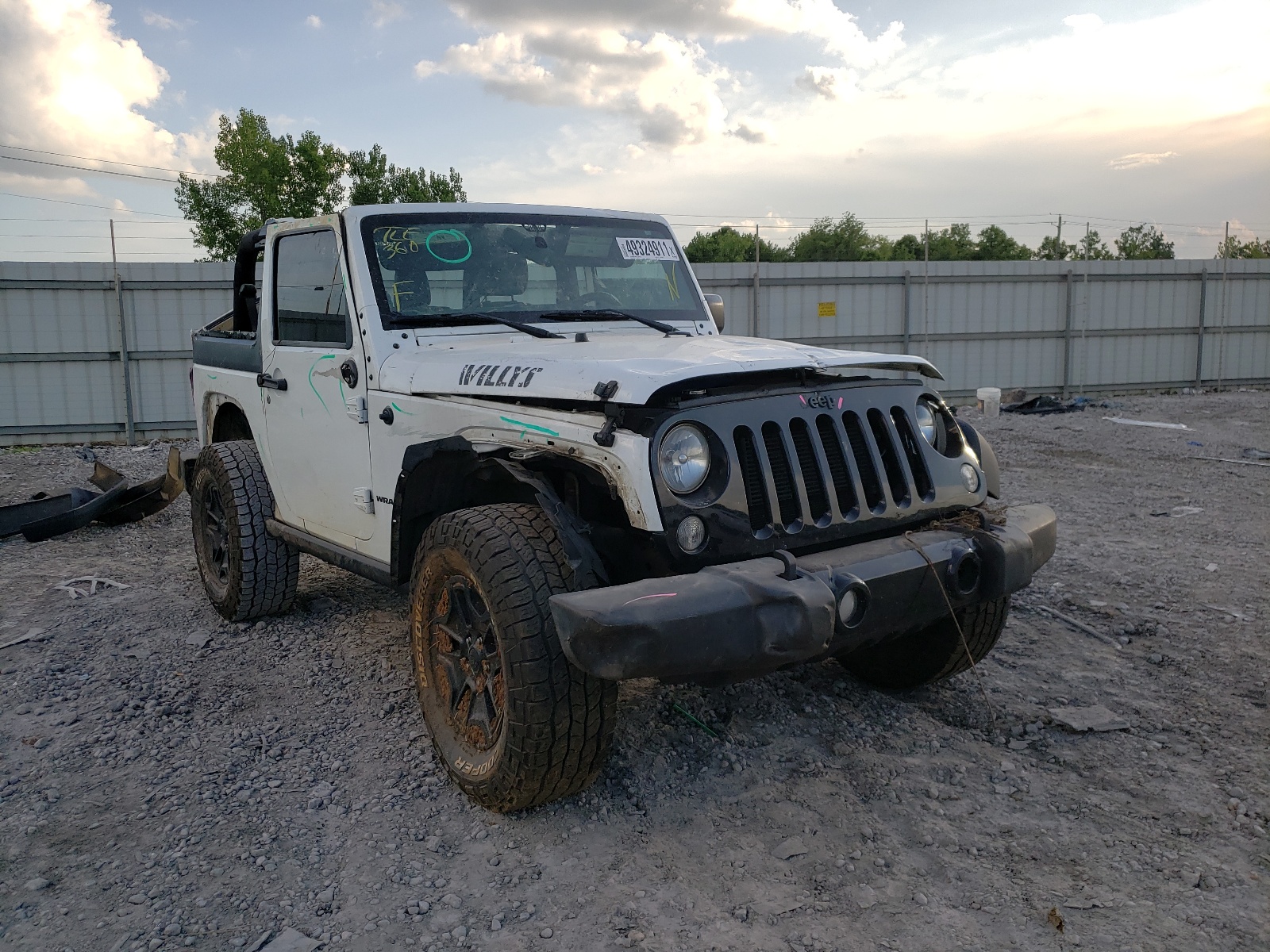 JEEP WRANGLER S 2015 with VIN 1C4AJWAG1FL554834 - Photo from auction