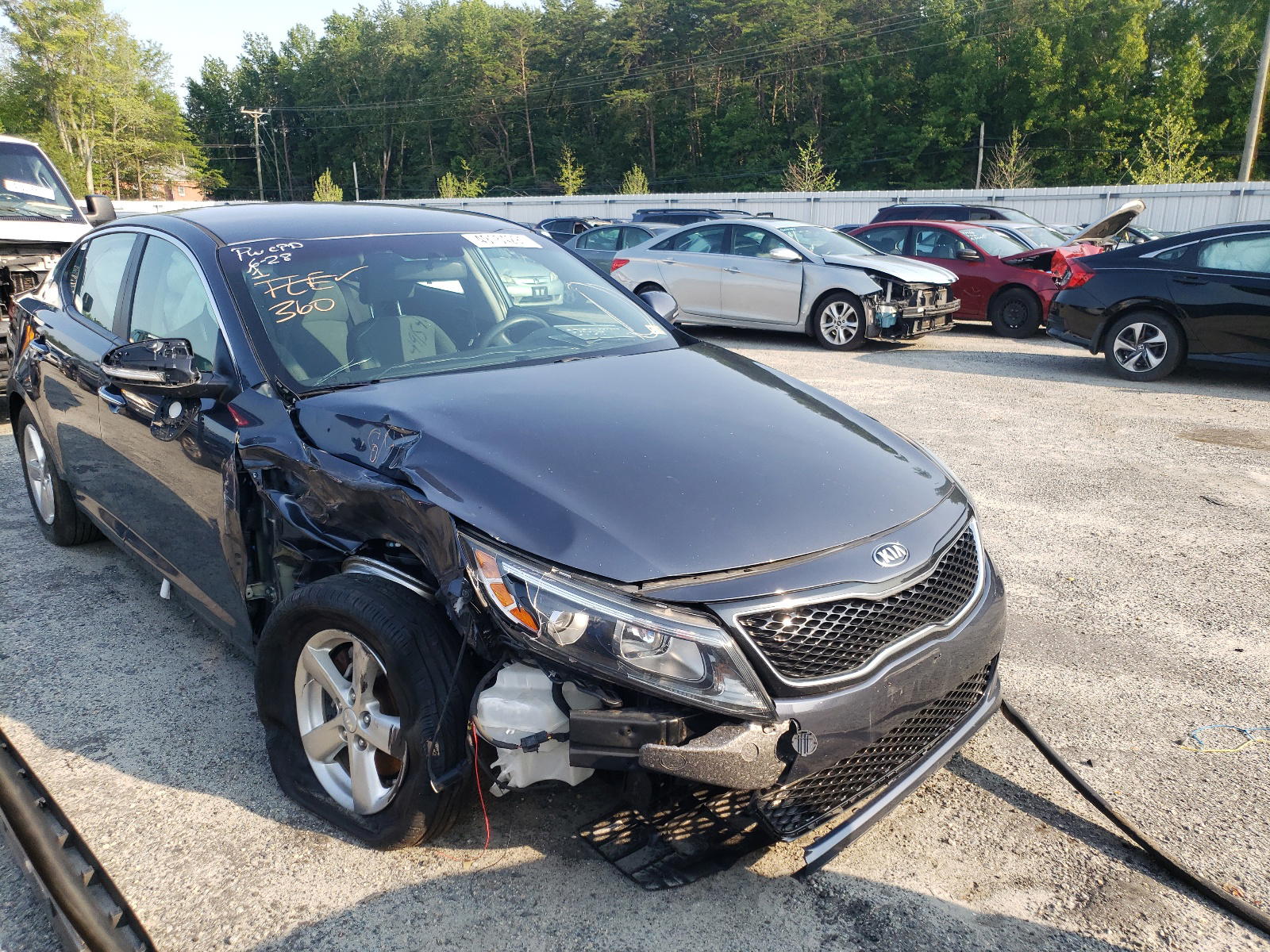 KIA OPTIMA LX 2015 with VIN KNAGM4A75F5546744 - Photo from auction