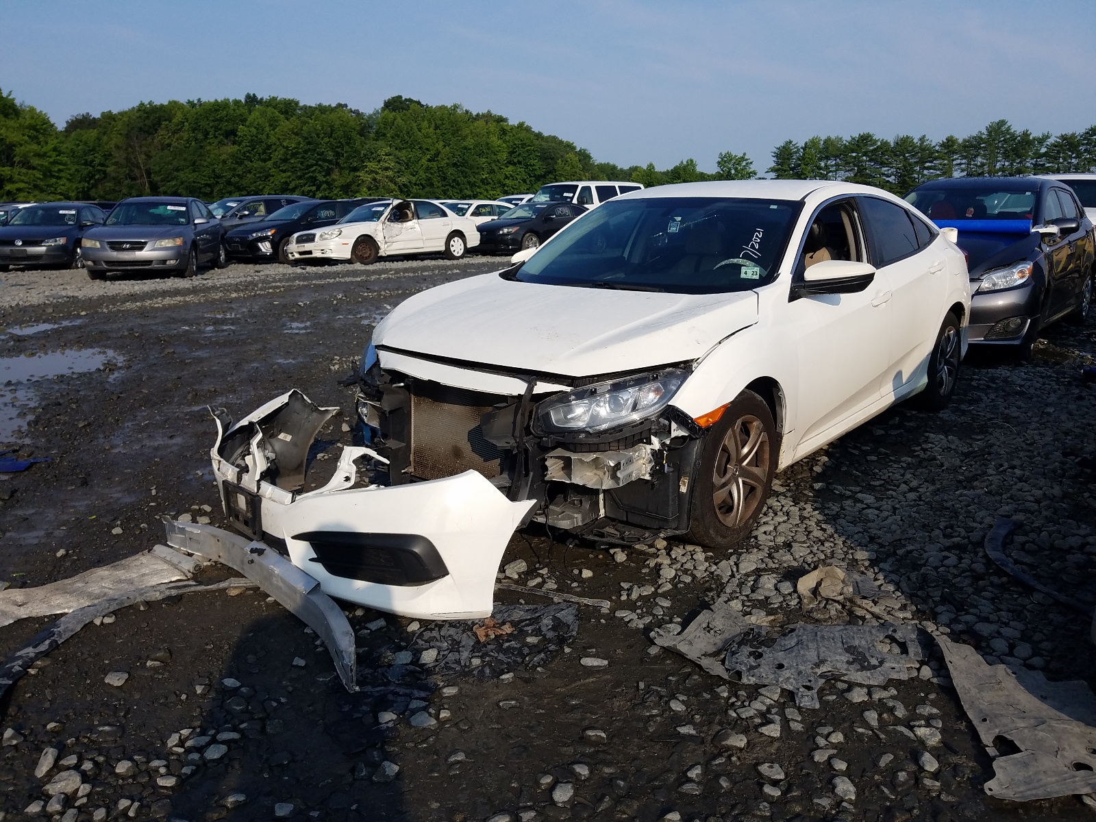 Photo 2 from auction – 2018 HONDA CIVIC LX with VIN 2HGFC2F57JH548964