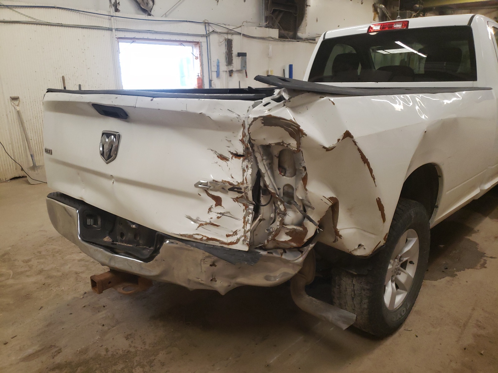 Photo 9 from auction – 2014 RAM 1500 SLT with VIN 3C6JR7ET9EG189036