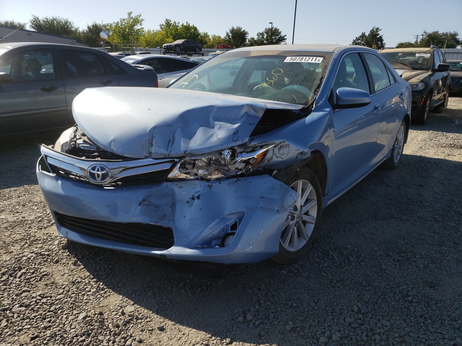 Photo 2 from auction – 2013 TOYOTA CAMRY HYBR with VIN 4T1BD1FK4DU092848