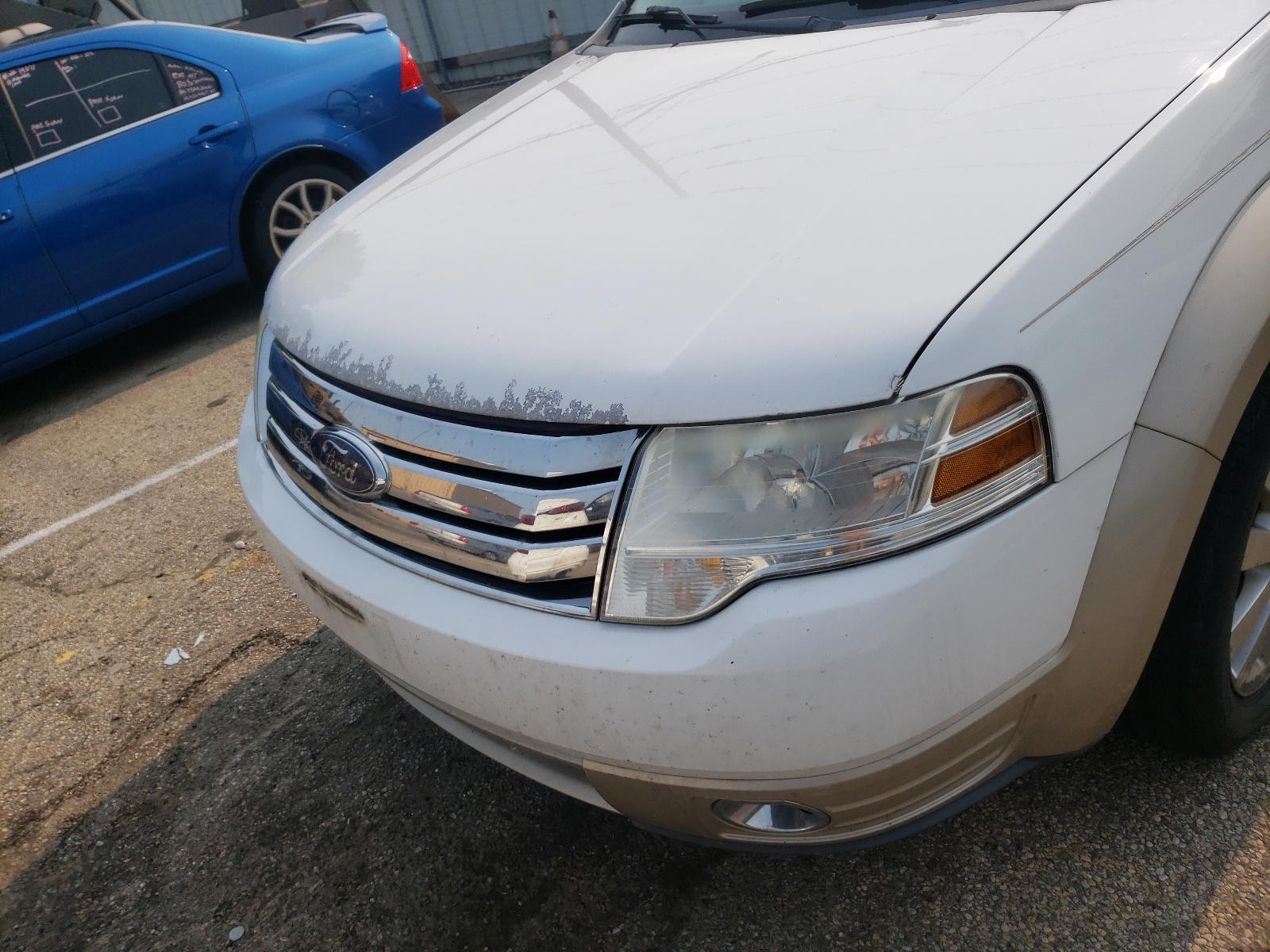 Photo 9 from auction – 2008 FORD TAURUS X E with VIN 1FMDK07W48GA28114