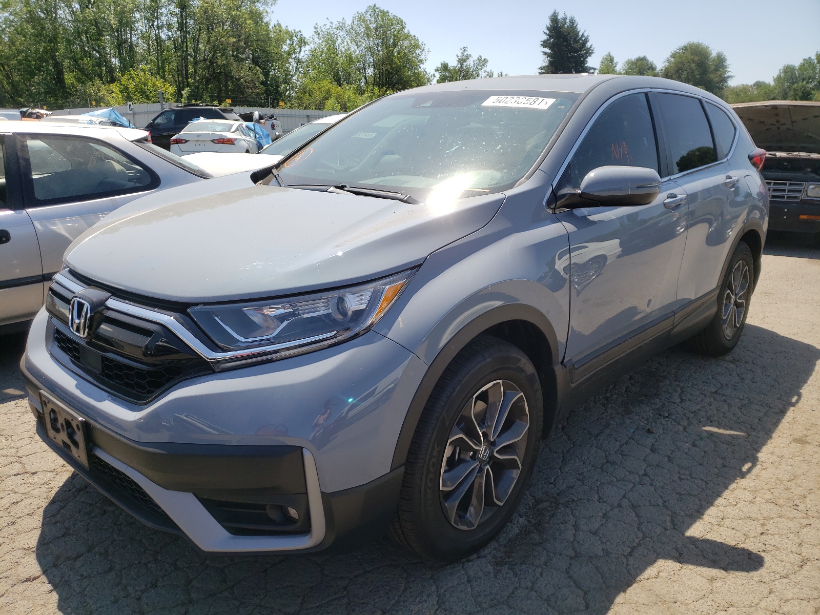 Photo 2 from auction – 2021 HONDA CR-V EX with VIN 7FARW2H56ME006799