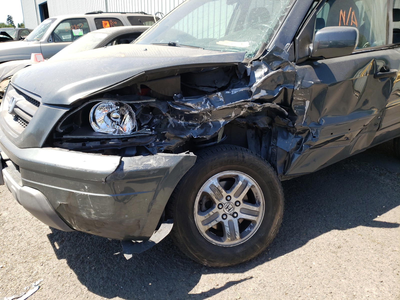 Photo 10 from auction – 2003 HONDA PILOT with VIN 2HKYF18483H603364