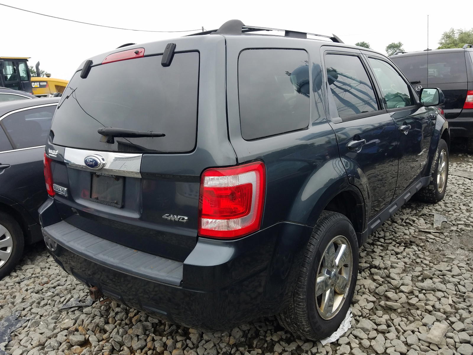 Photo 4 from auction – 2008 FORD ESCAPE LIM with VIN 1FMCU94128KE51323