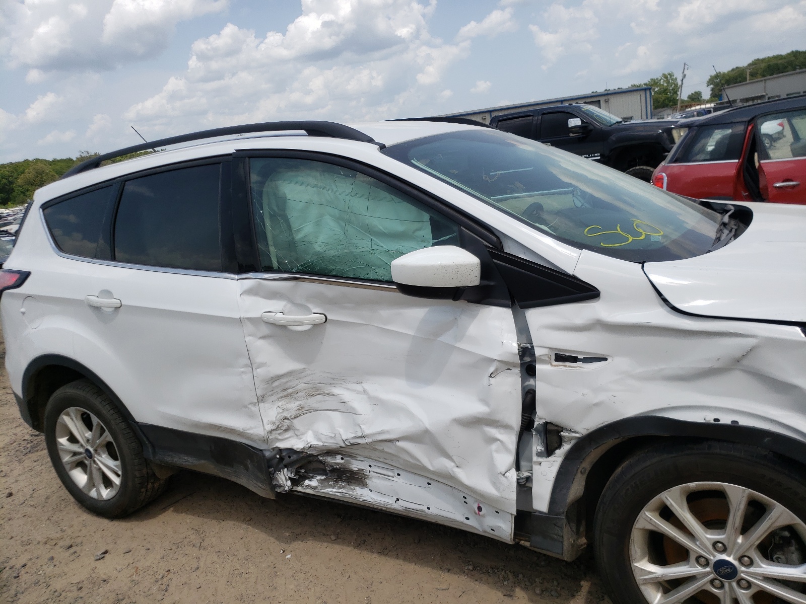 Photo 9 from auction – 2018 FORD ESCAPE SE with VIN 1FMCU9GD8JUD56636
