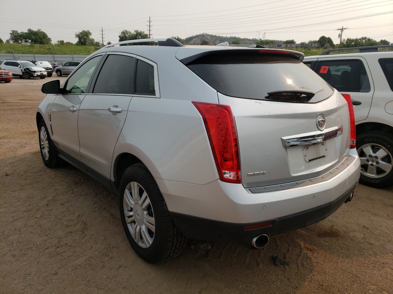 Photo 3 from auction – 2011 CADILLAC SRX LUXURY with VIN 3GYFNAEY1BS529625