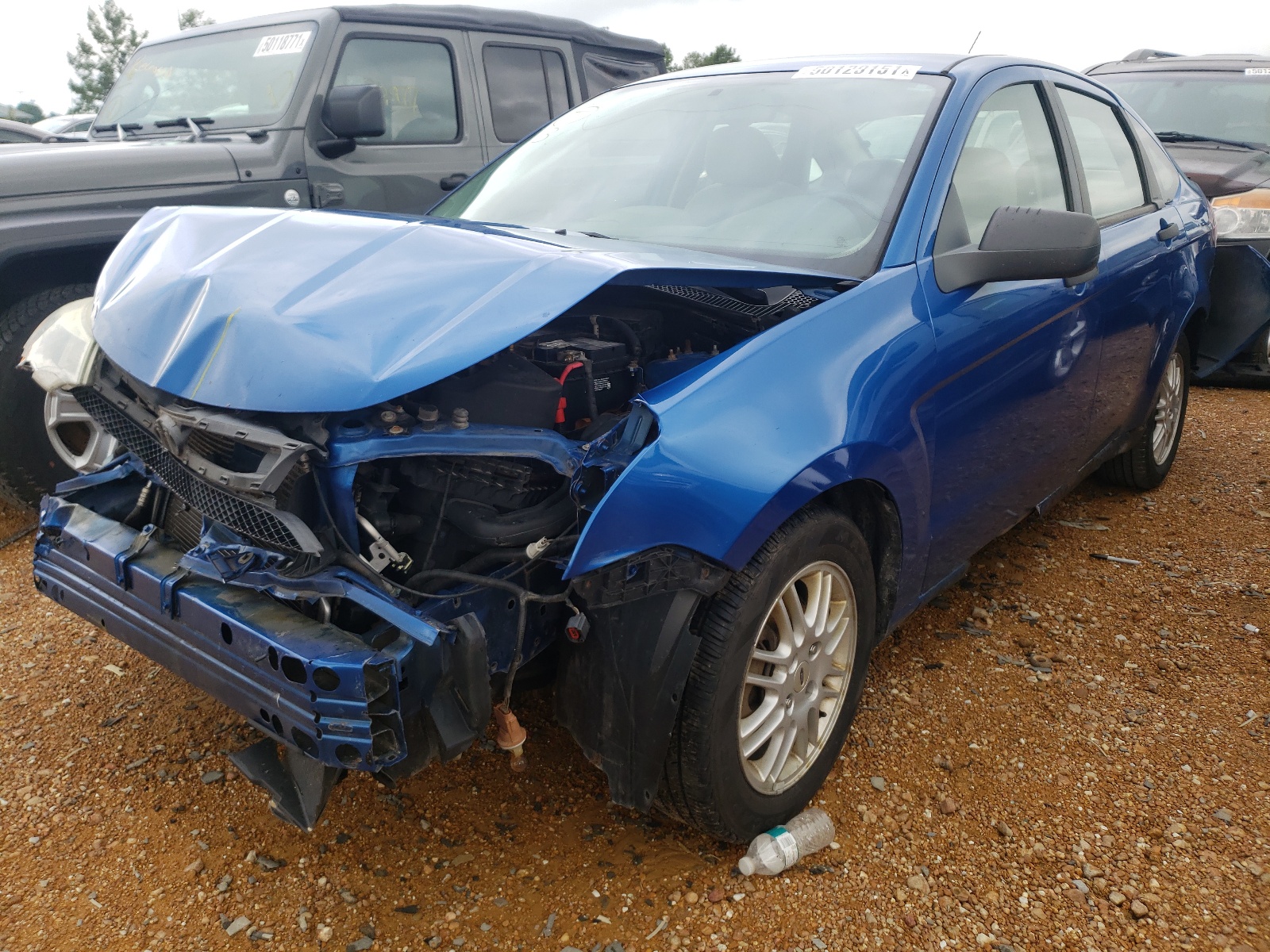 Photo 2 from auction – 2010 FORD FOCUS SE with VIN 1FAHP3FN3AW121600
