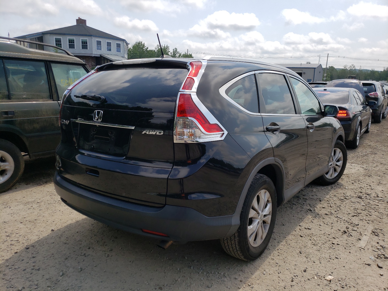 Photo 4 from auction – 2014 HONDA CR-V EXL with VIN 2HKRM4H73EH722271