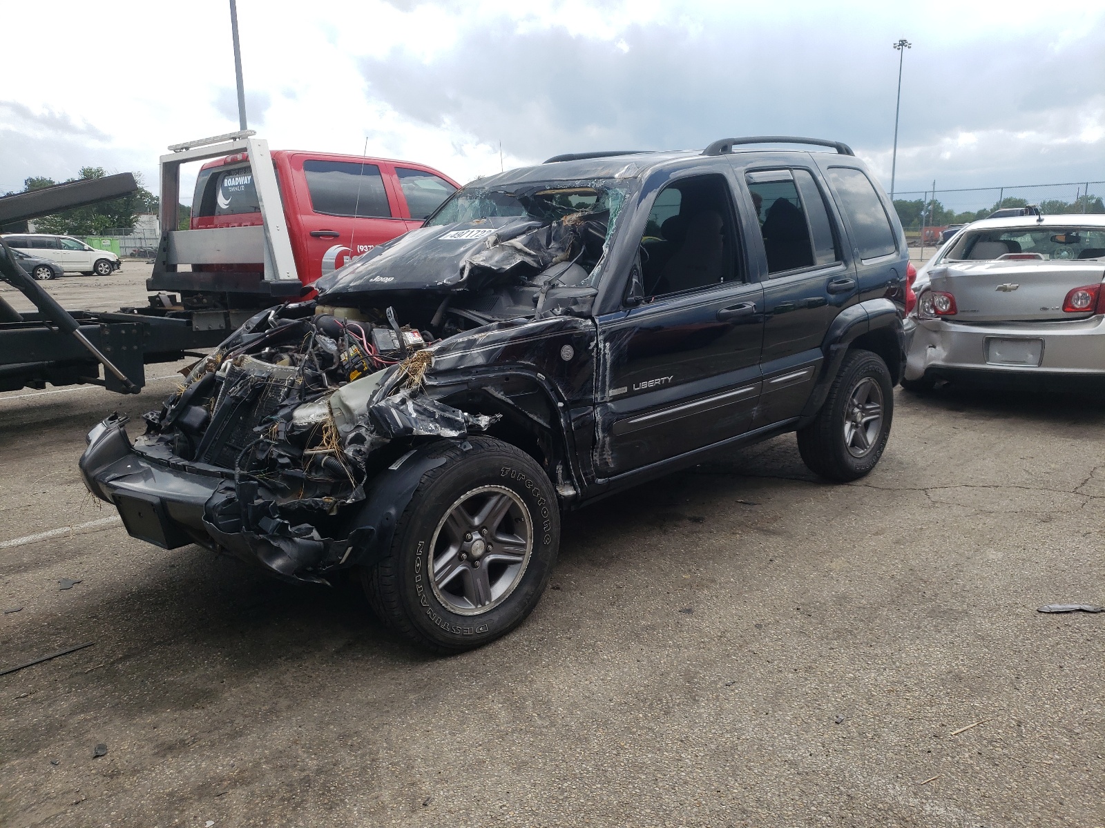 Photo 2 from auction – 2004 JEEP LIBERTY SP with VIN 1J4GL48K34W181188