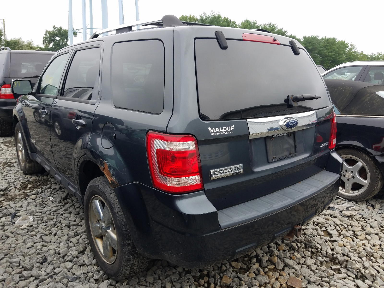 Photo 3 from auction – 2008 FORD ESCAPE LIM with VIN 1FMCU94128KE51323
