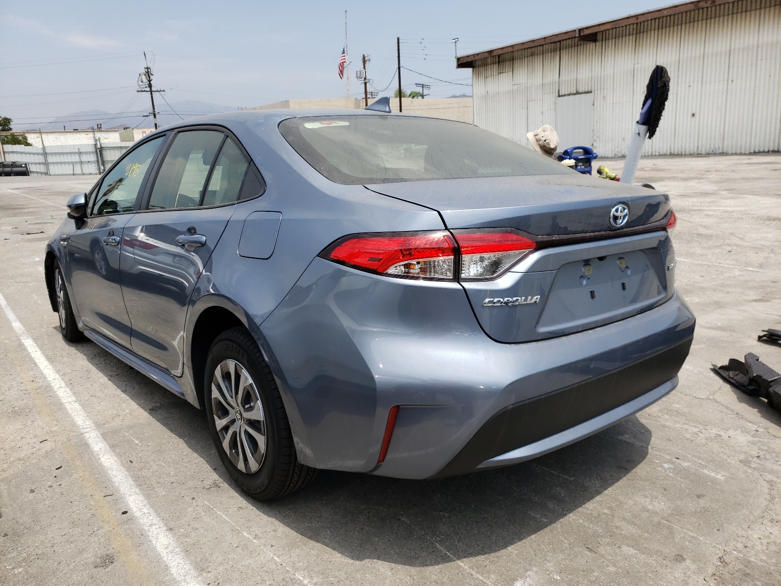 Photo 3 from auction – 2021 TOYOTA COROLLA LE with VIN JTDEAMDE5MJ027226