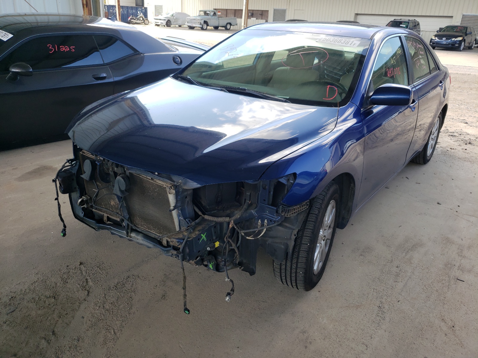 Photo 2 from auction – 2007 TOYOTA 1 TON TRUC with VIN JTNBE46K573033834