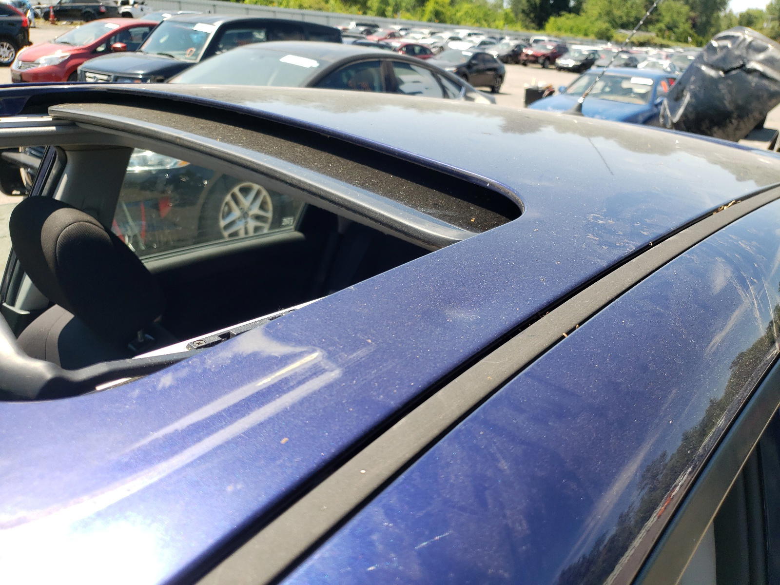 Photo 9 from auction – 2004 MAZDA 3 HATCHBAC with VIN JM1BK143241185701