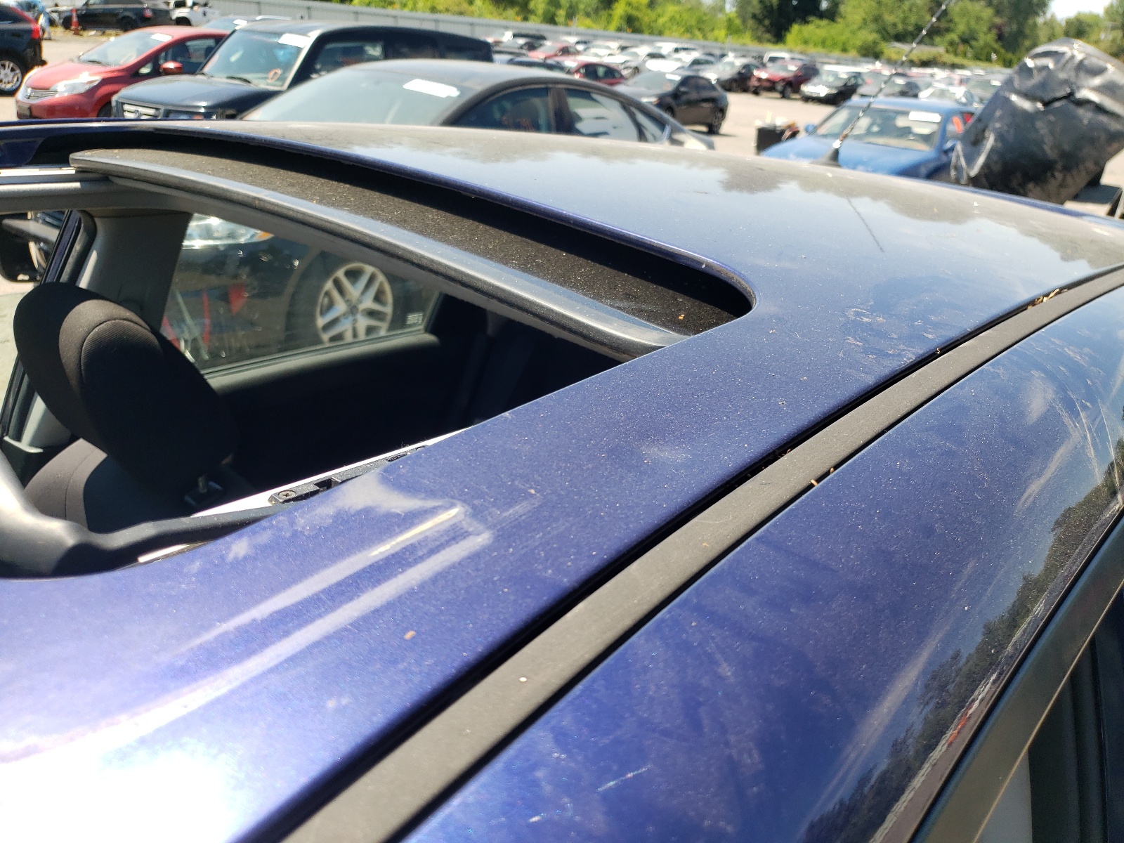 Foto 9 de la subasta – 2004 MAZDA 3 HATCHBAC con VIN JM1BK143241185701