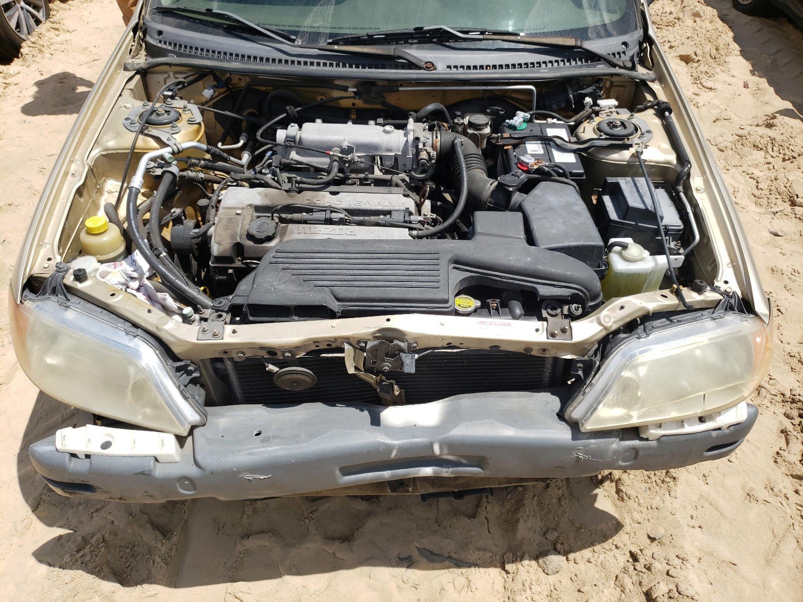Photo 7 from auction – 2001 MAZDA PROTEGE DX with VIN JM1BJ222410410544