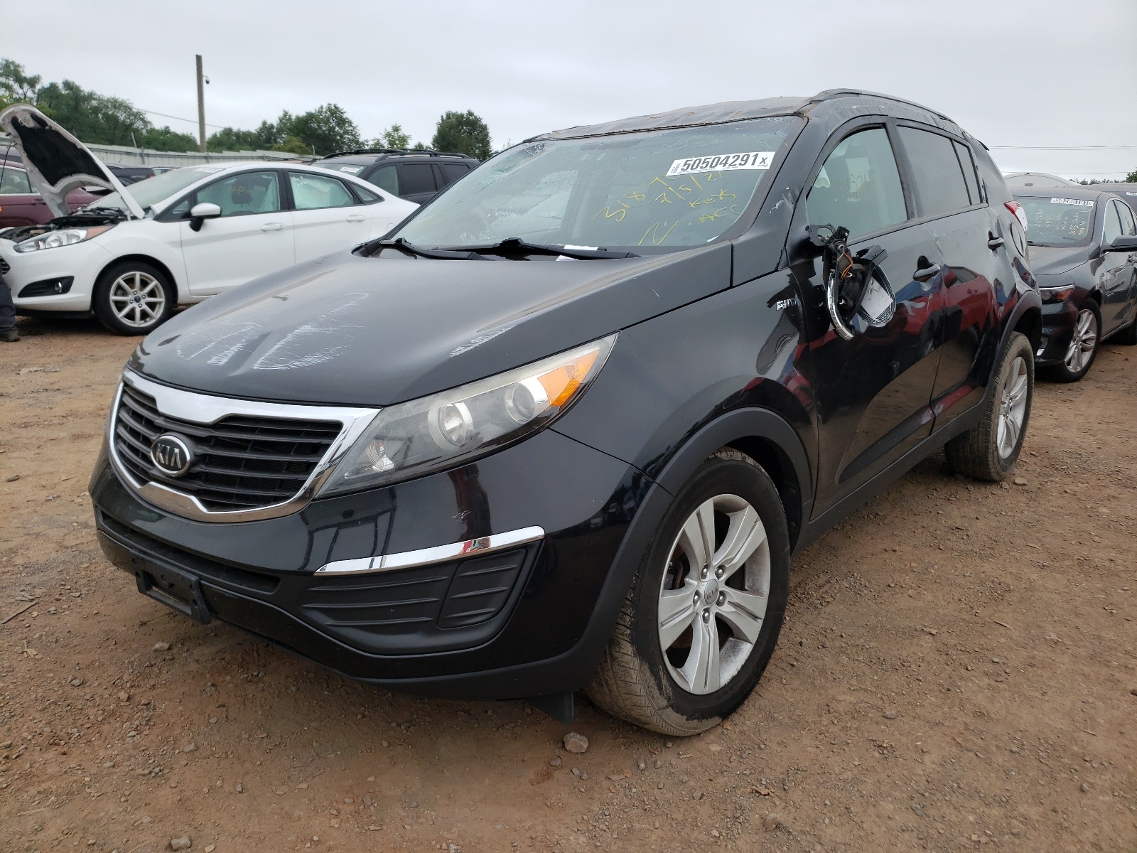 Photo 2 from auction – 2011 KIA SPORTAGE L with VIN KNDPBCA24B7169412