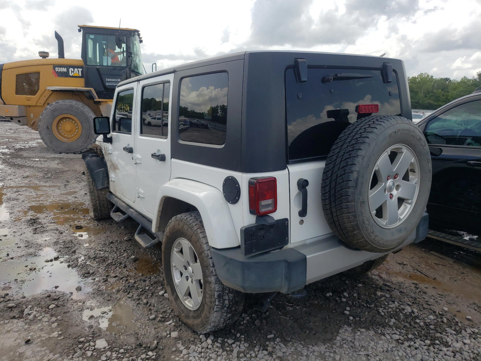 Photo 3 from auction – 2011 JEEP WRANGLER U with VIN 1J4HA5H16BL577606