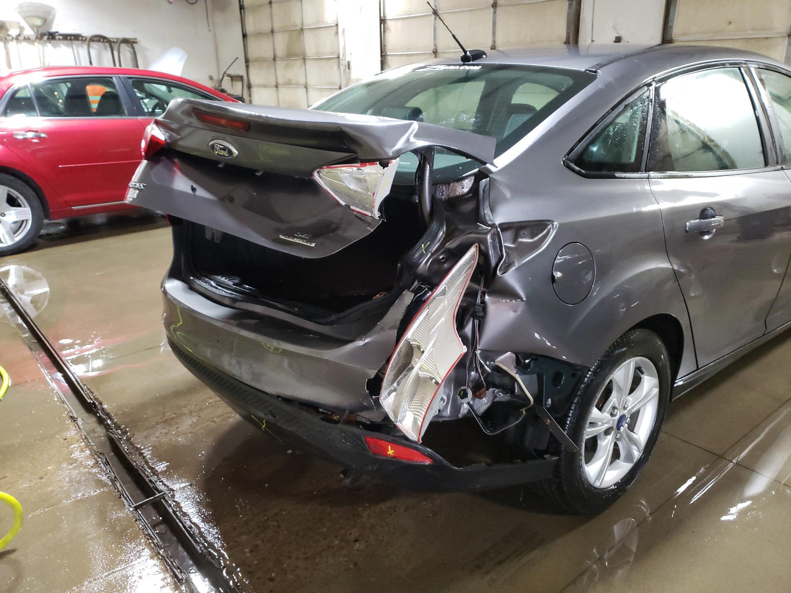 Photo 9 from auction – 2014 FORD FOCUS SE with VIN 1FADP3F27EL107209