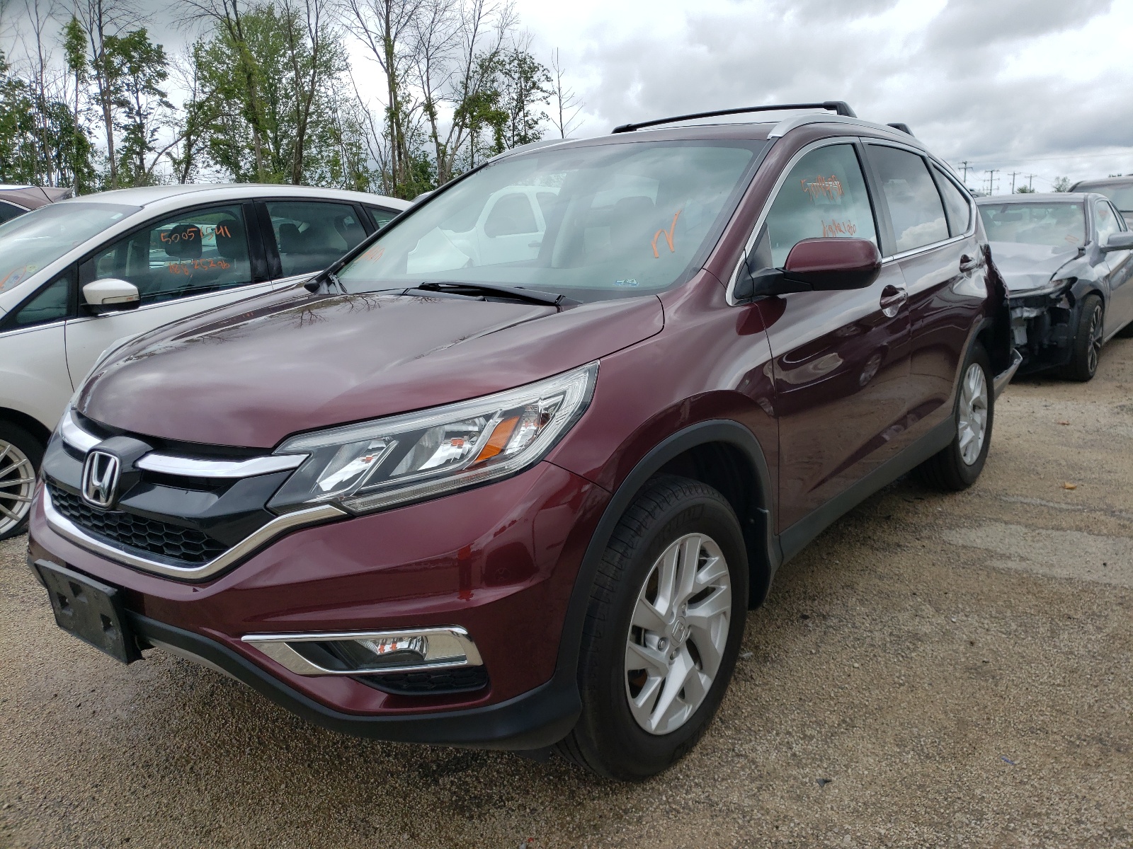 Photo 2 from auction – 2016 HONDA CR-V with VIN 5J6RM4H55GL028723