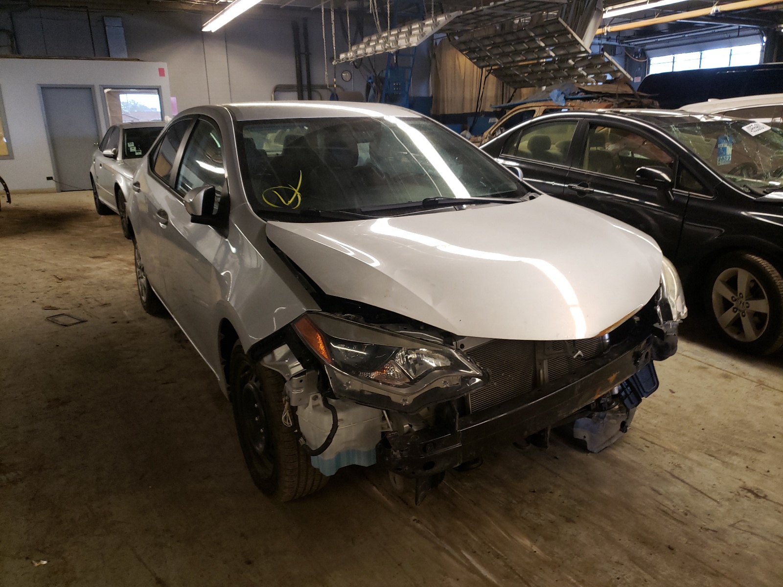TOYOTA COROLLA L 2015 with VIN 5YFBURHE3FP250770 - Photo from auction