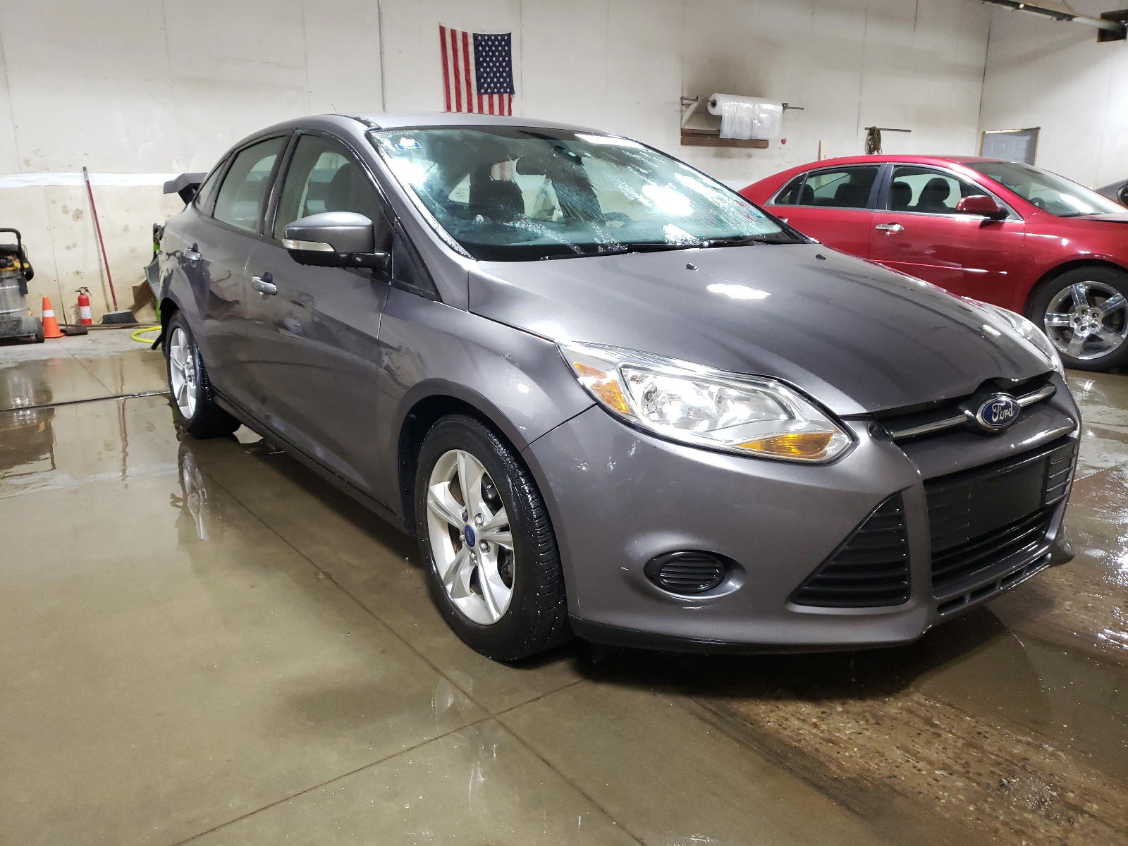FORD FOCUS SE 2014 with VIN 1FADP3F27EL107209 - Photo from auction