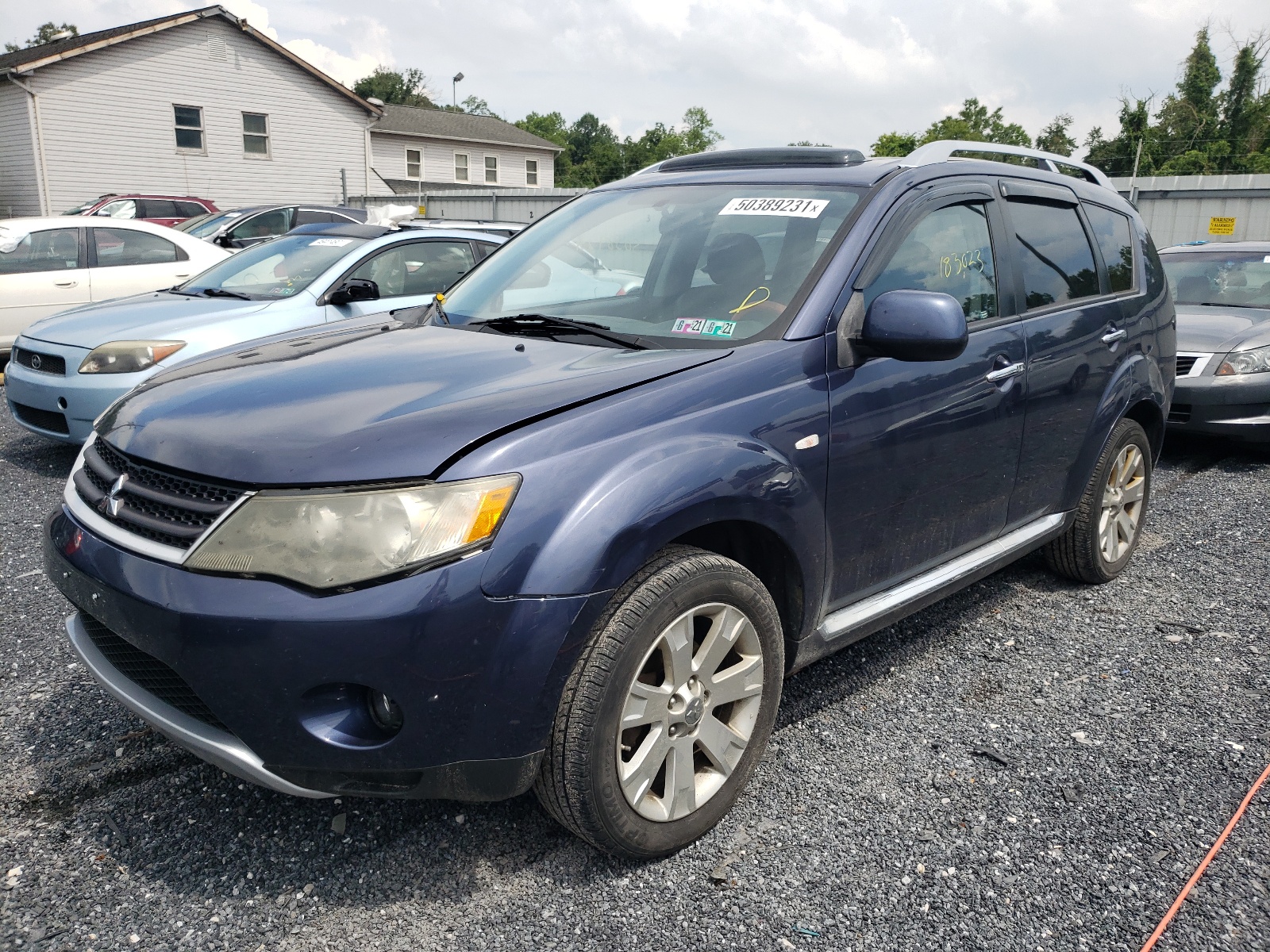 Photo 2 from auction – 2009 MITSUBISHI OUTLANDER with VIN JA4MT31W89Z006094