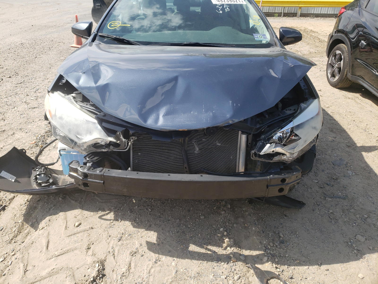 Photo 7 from auction – 2014 TOYOTA COROLLA EC with VIN 2T1BPRHE7EC164786