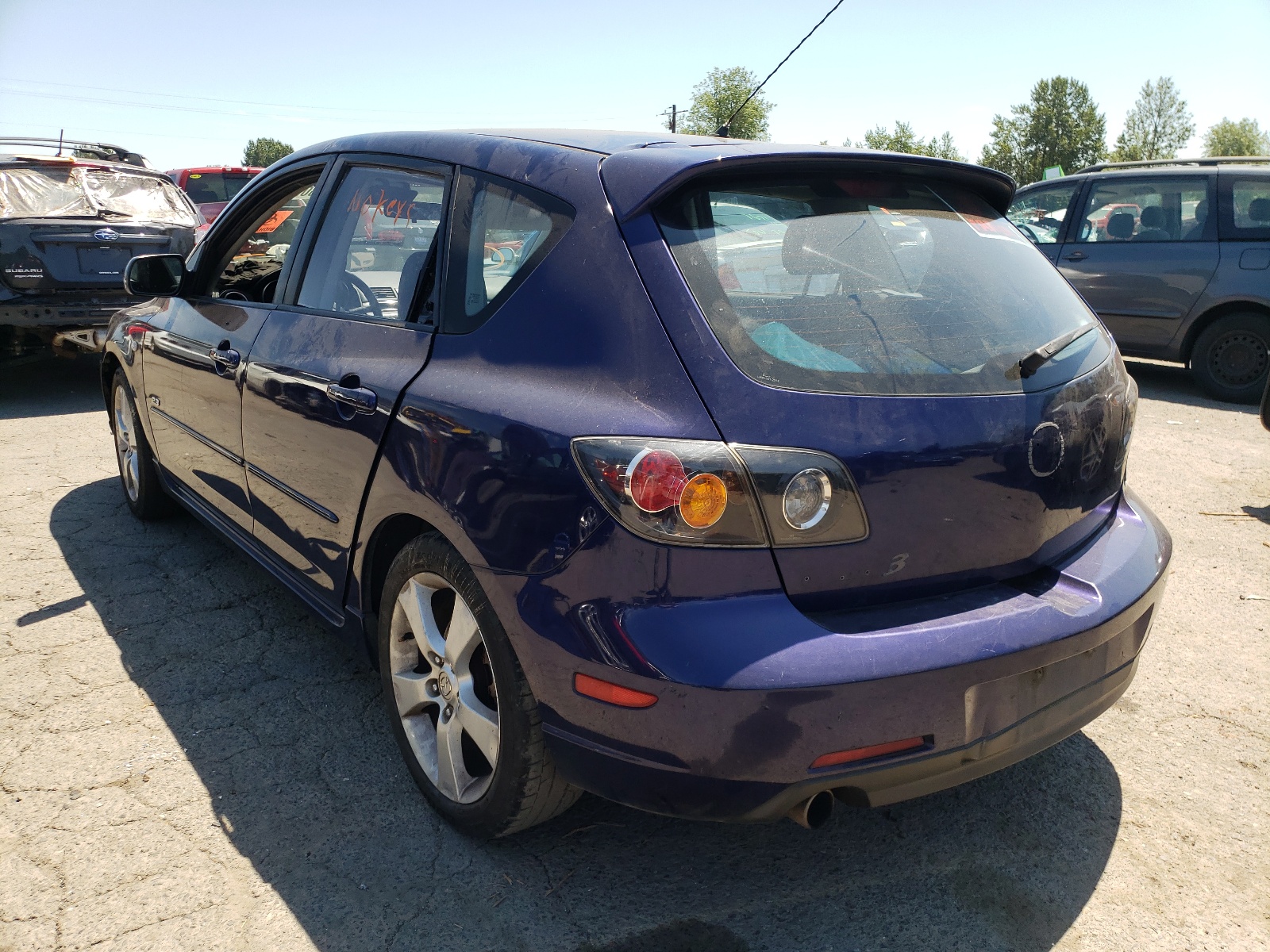 Foto 3 de la subasta – 2004 MAZDA 3 HATCHBAC con VIN JM1BK143241185701