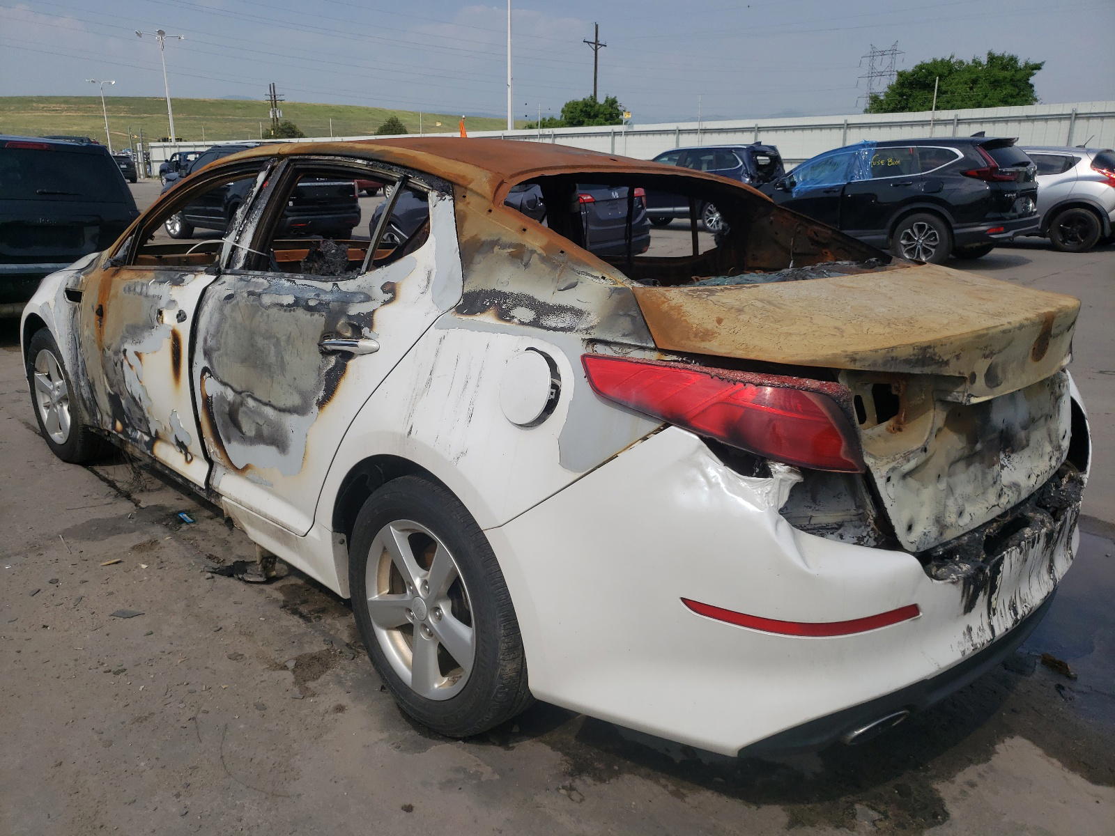 Photo 3 from auction – 2015 KIA OPTIMA LX with VIN KNAGM4A77F5639202