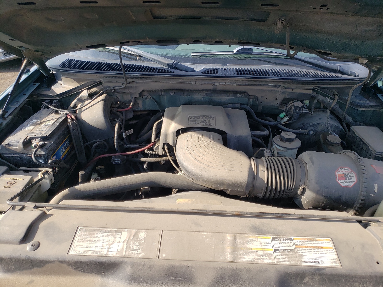 Photo 7 from auction – 1999 FORD F150 with VIN 1FTRX18LXXNA87751