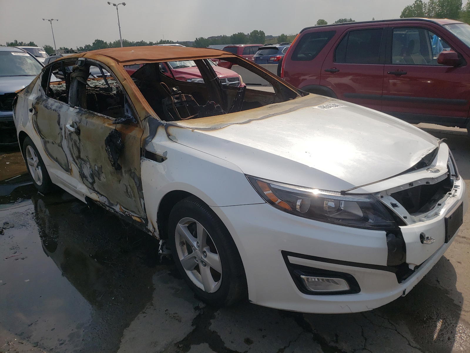 KIA OPTIMA LX 2015 with VIN KNAGM4A77F5639202 - Photo from auction