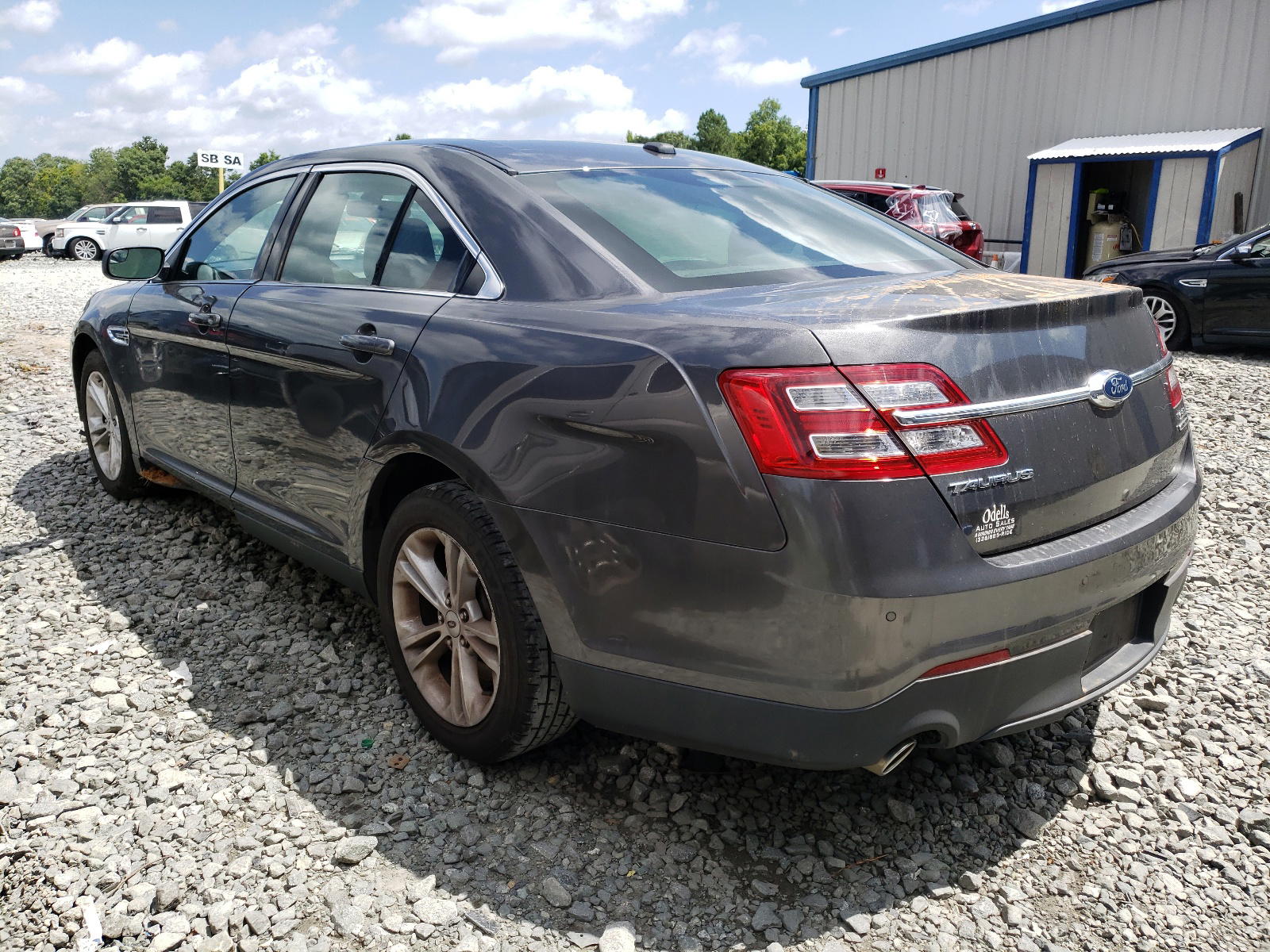 Photo 3 from auction – 2015 FORD TAURUS SEL with VIN 1FAHP2E83FG160890