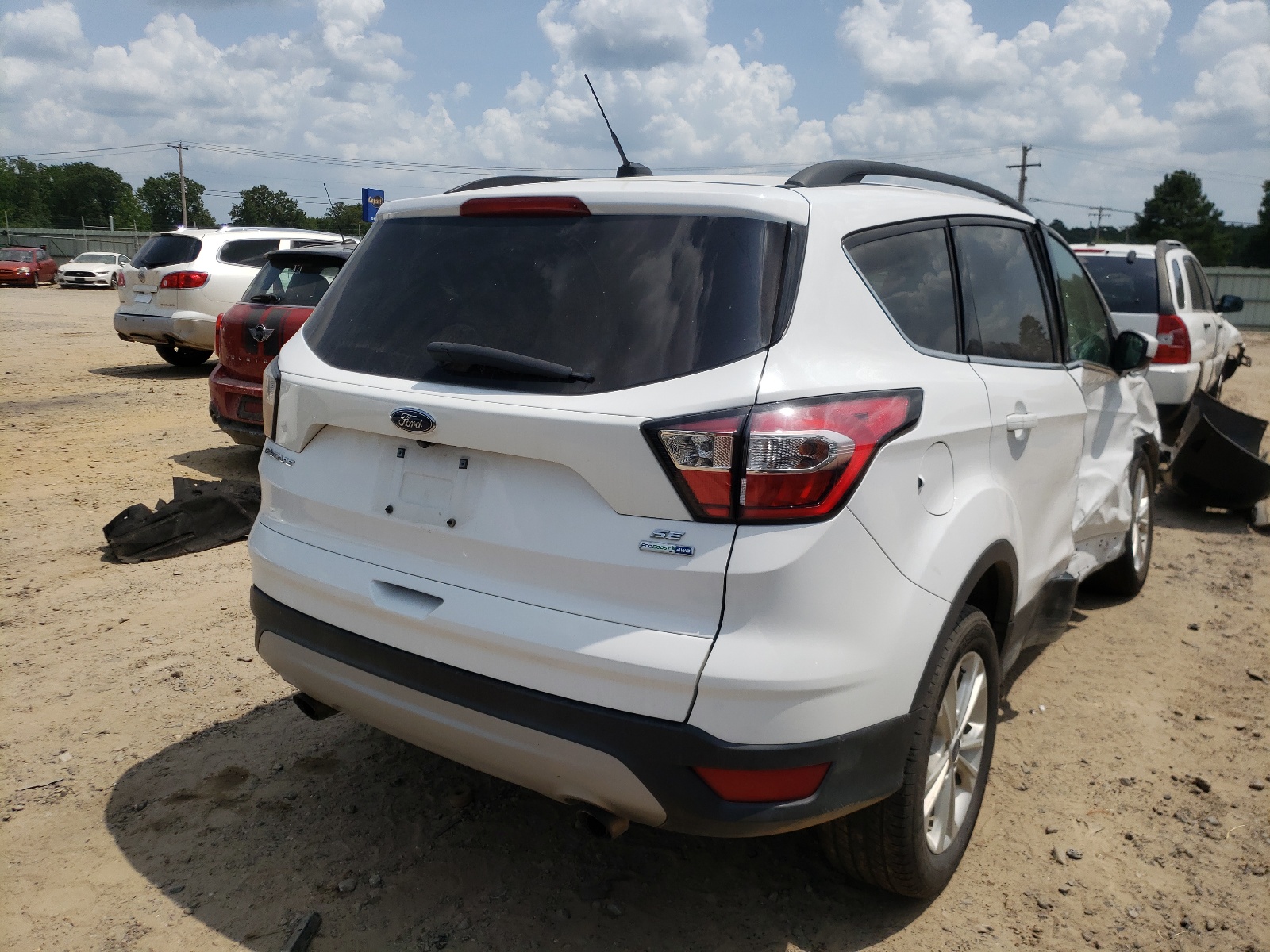 Photo 4 from auction – 2018 FORD ESCAPE SE with VIN 1FMCU9GD8JUD56636