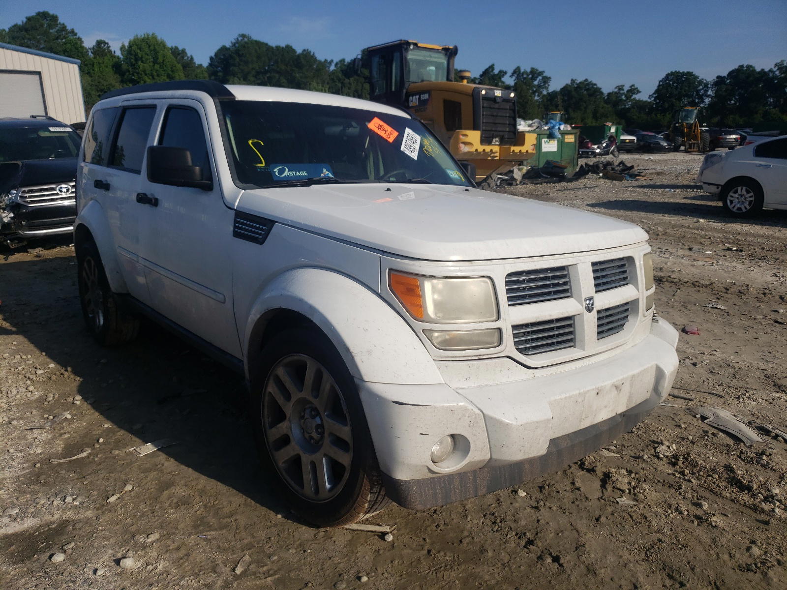 DODGE NITRO HEAT 2011 with VIN 1D4PT4GKXBW597231 - Photo from auction