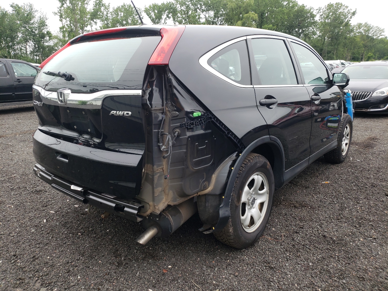 Photo 4 from auction – 2016 HONDA CR-V LX with VIN 5J6RM4H36GL009810