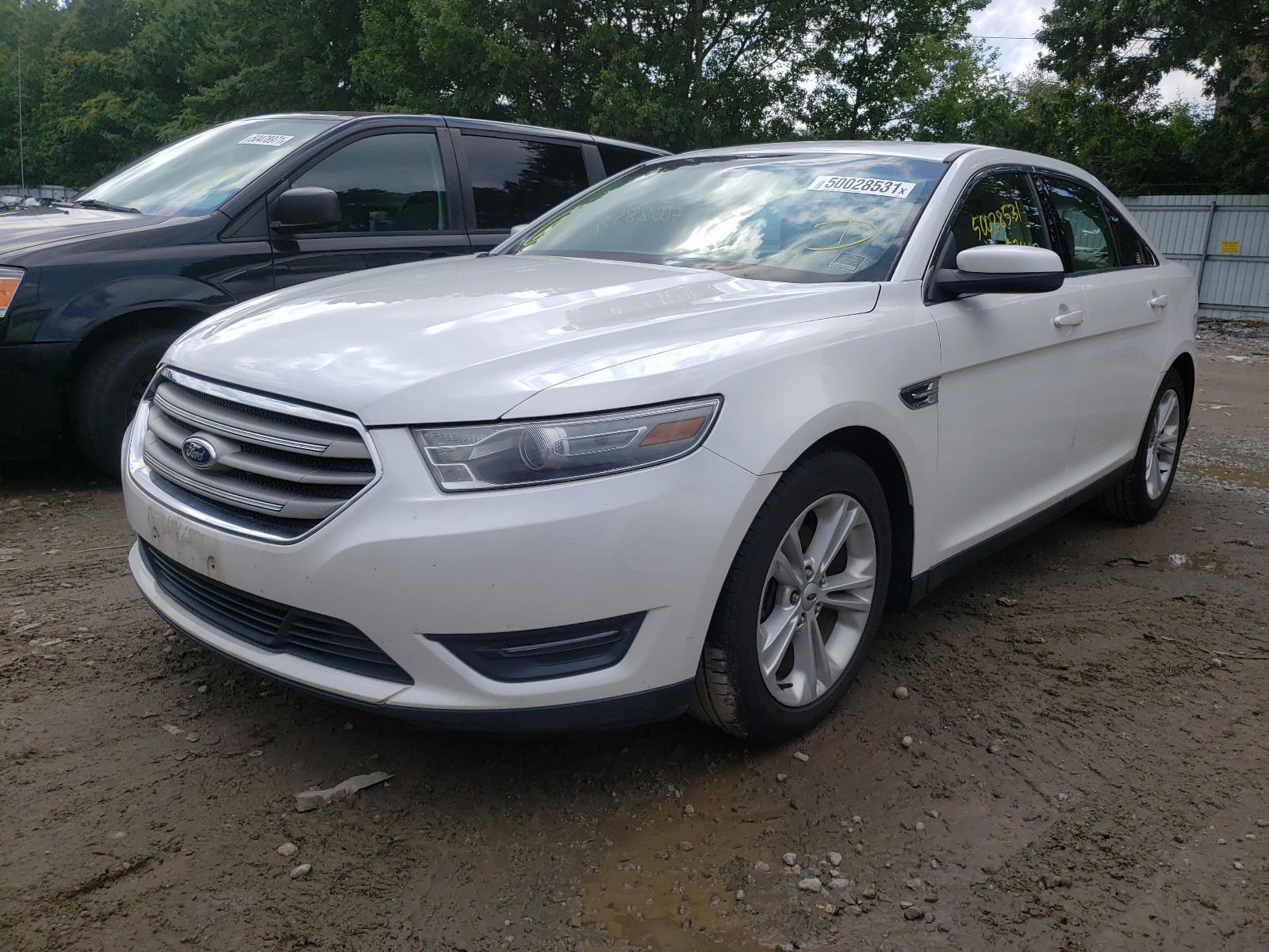 Photo 2 from auction – 2013 FORD TAURUS SEL with VIN 1FAHP2E98DG171079