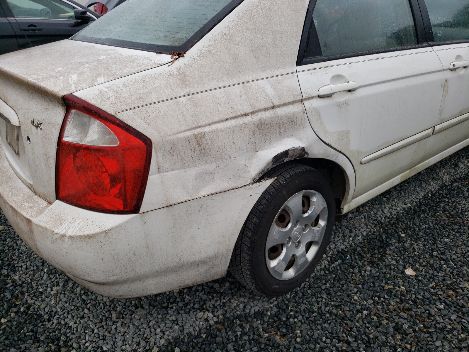 Photo 9 from auction – 2004 KIA SPECTRA LX with VIN KNAFE121245011868