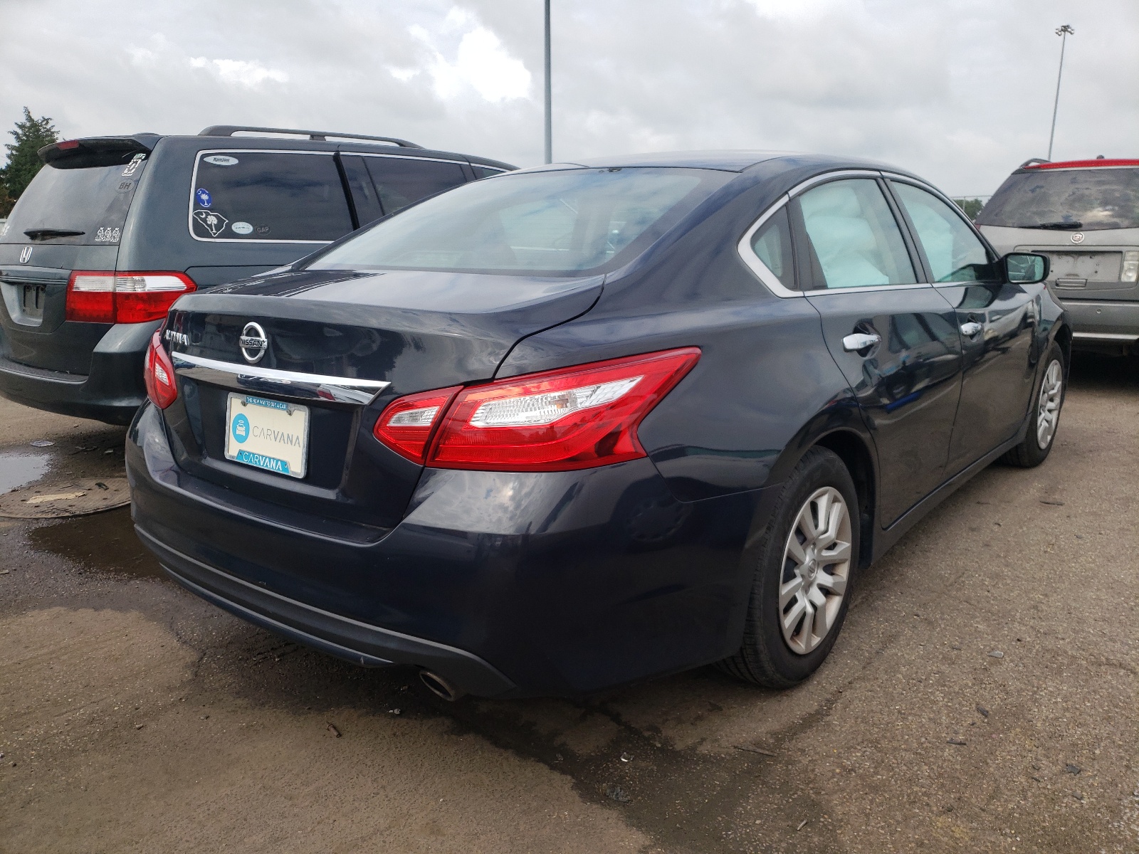Photo 4 from auction – 2016 NISSAN ALTIMA 2.5 with VIN 1N4AL3AP8GN372892