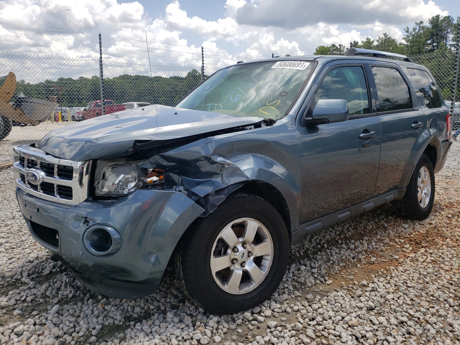 Photo 2 from auction – 2011 FORD ESCAPE LIM with VIN 1FMCU9EG3BKB35777