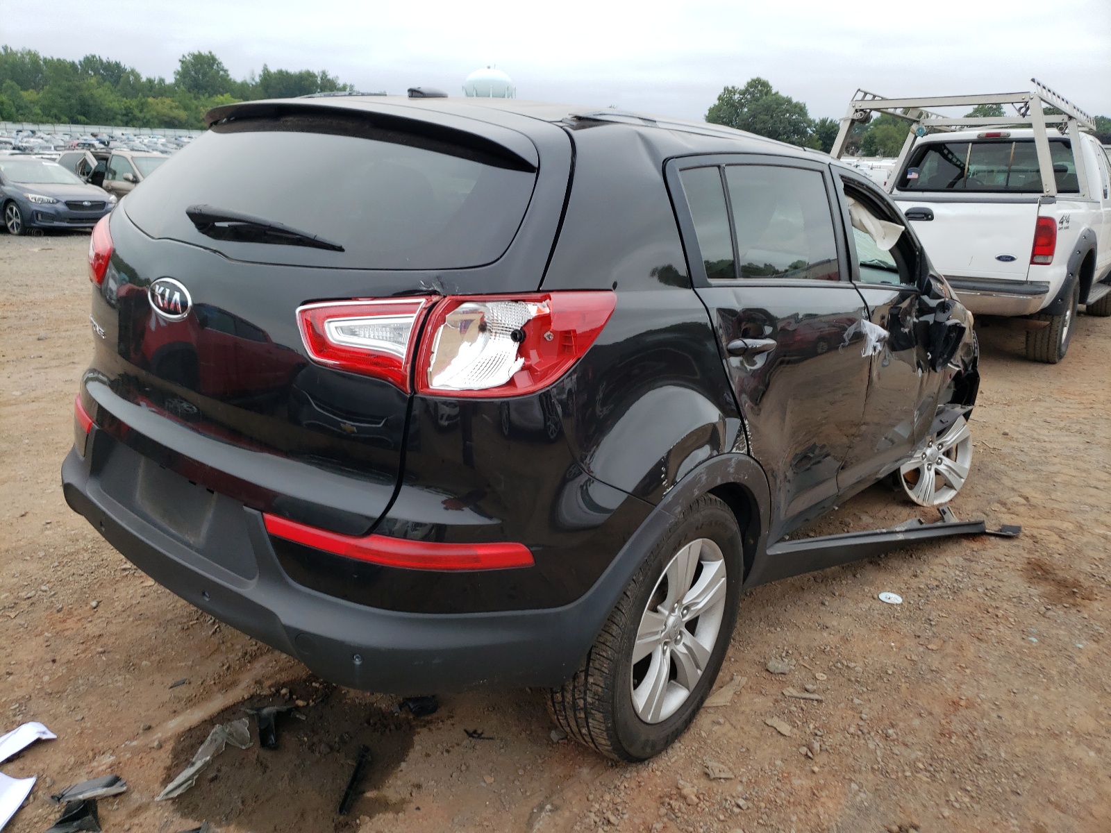 Photo 4 from auction – 2011 KIA SPORTAGE L with VIN KNDPBCA24B7169412