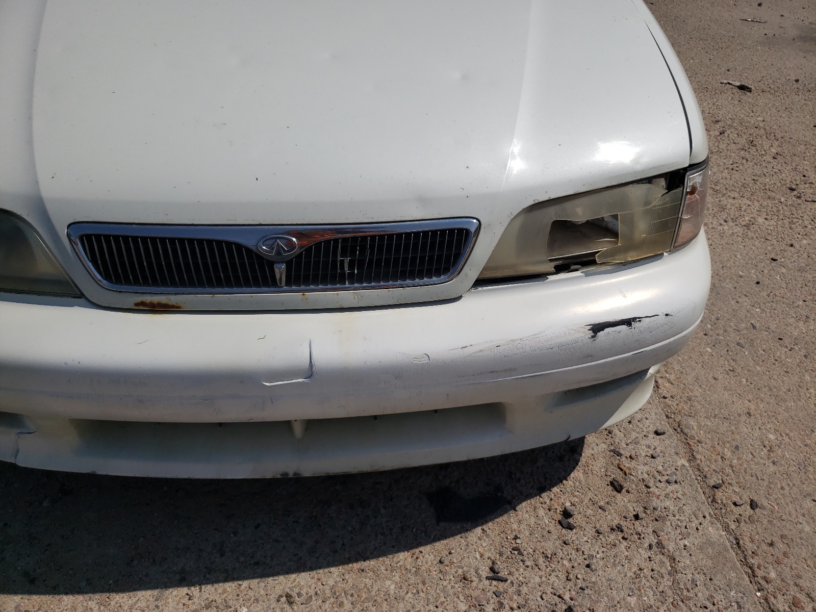 Photo 9 from auction – 2002 INFINITI G20 with VIN JNKCP11A42T504623