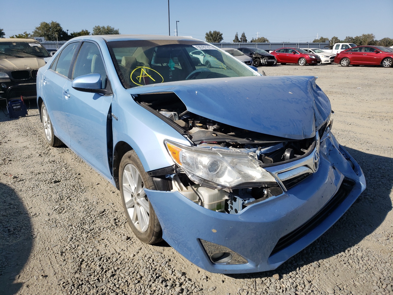 TOYOTA CAMRY HYBR 2013 with VIN 4T1BD1FK4DU092848 - Photo from auction