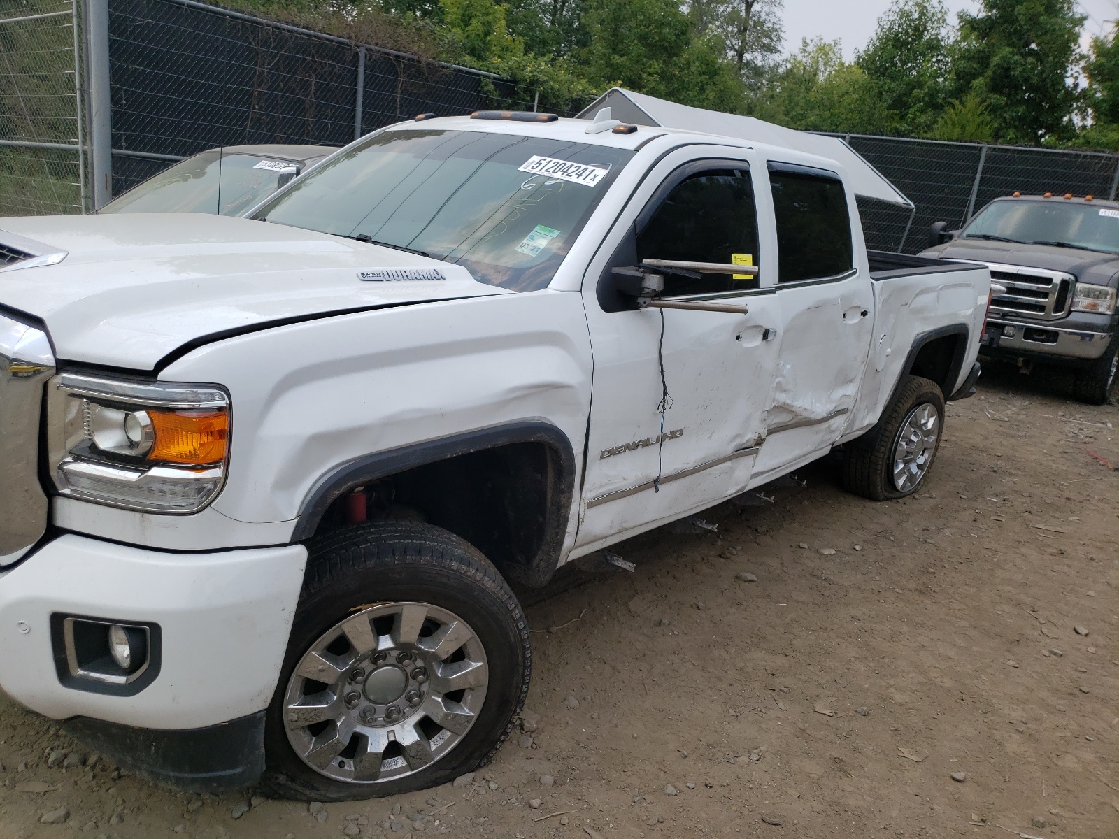 Photo 9 from auction – 2017 GMC SIERRA K25 with VIN 1GT12UEY1HF226237