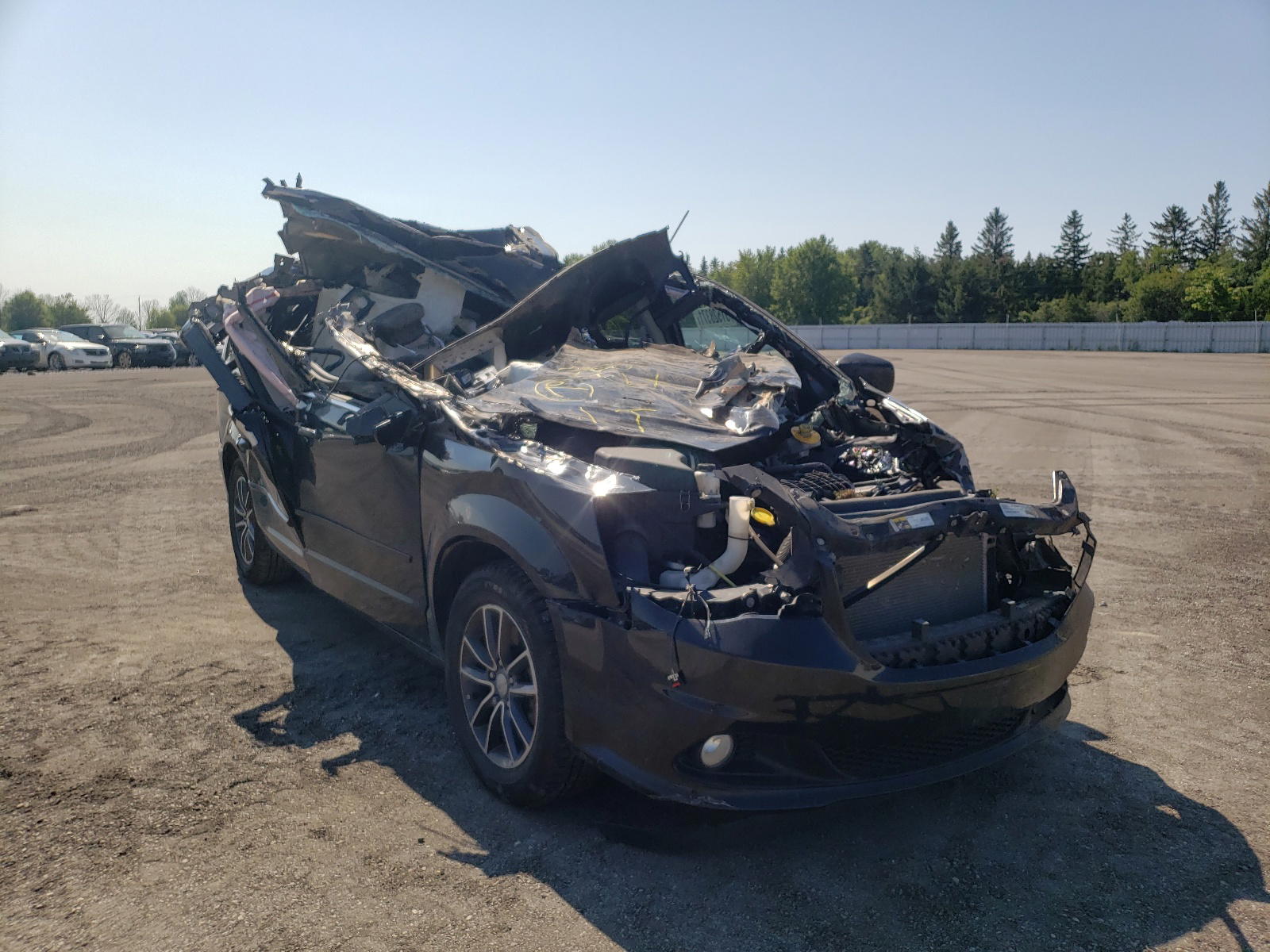 DODGE GRAND CARA 2016 with VIN 2C4RDGBG4GR398246 - Photo from auction
