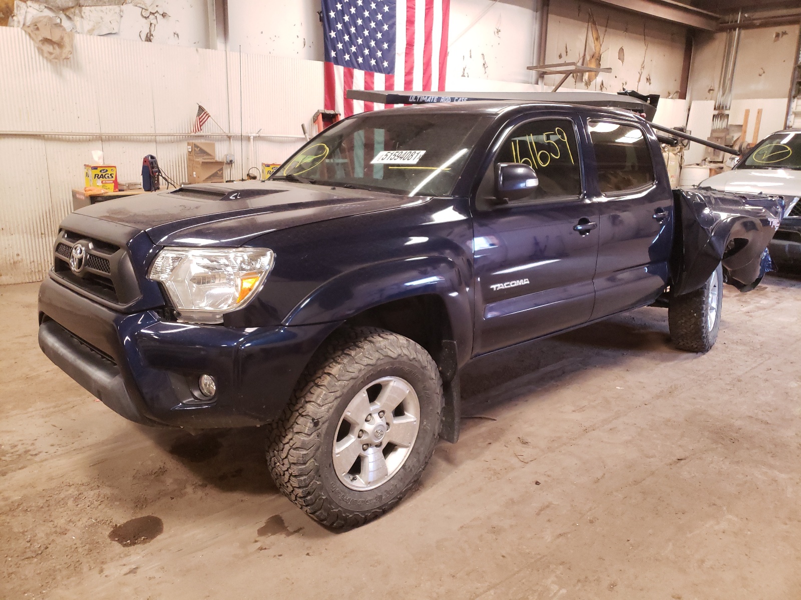 Photo 2 from auction – 2013 TOYOTA TACOMA DOU with VIN 5TFLU4EN5DX071396