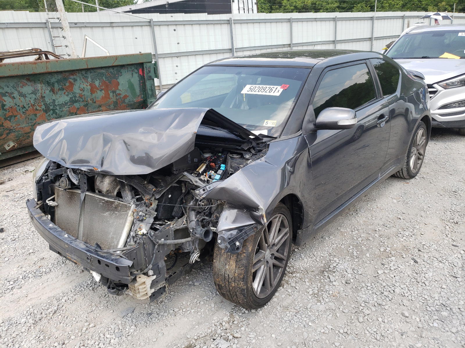 Photo 2 from auction – 2011 TOYOTA SCION TC with VIN JTKJF5C77B3013752