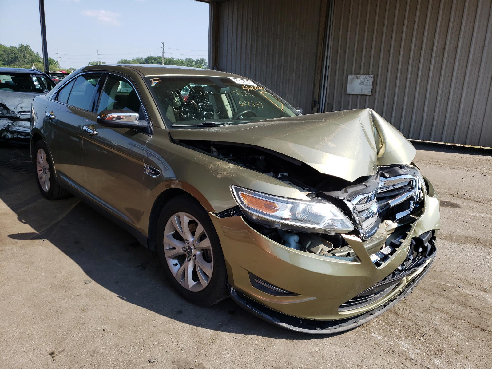 FORD TAURUS SEL 2012 with VIN 1FAHP2EW2CG118401 - Photo from auction